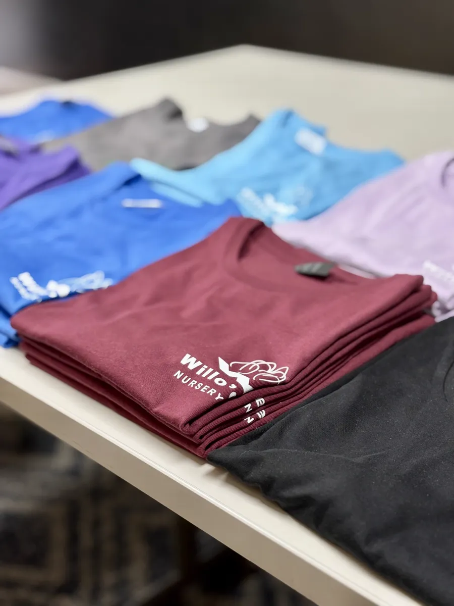 DTF printed uniform apparel arranged for a business order