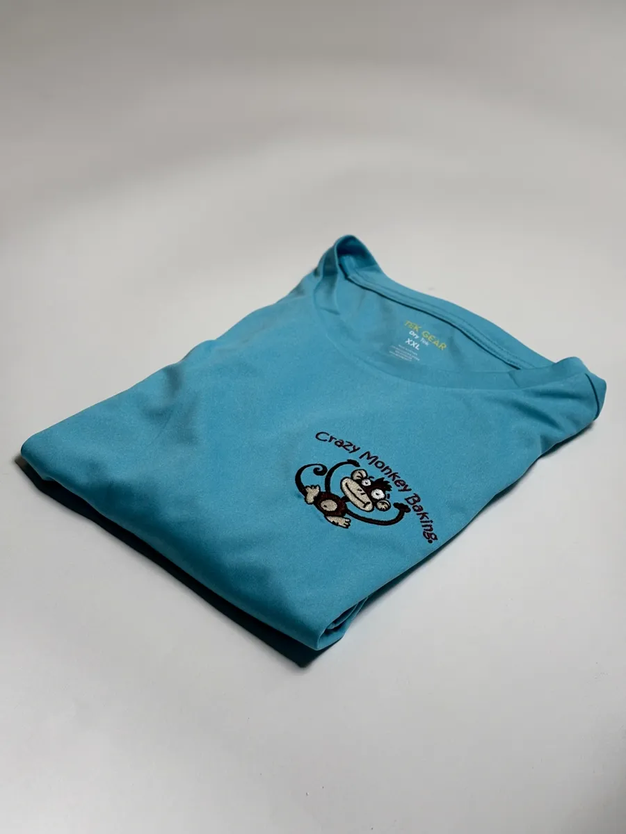 Embroidered shirt displayed for a small-business apparel order