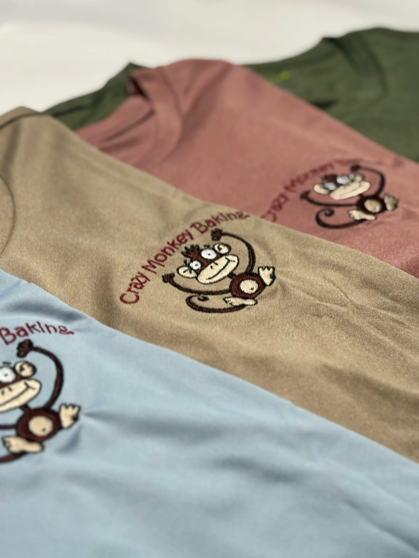 Just Name It branded apparel on a local business team